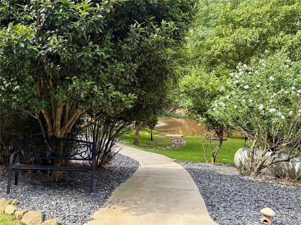 5 bedroom, 4 bathroom, 4,384 sq ft single family residence for sale at 7480 Shadburn Ferry Road, Cumming, GA 30041 — photo 10