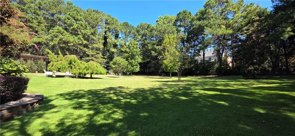 5 bedroom, 6 bathroom, 5,015 sq ft single family residence for sale at 1066 Bridgewater Walk, Snellville, GA 30078 — photo 4