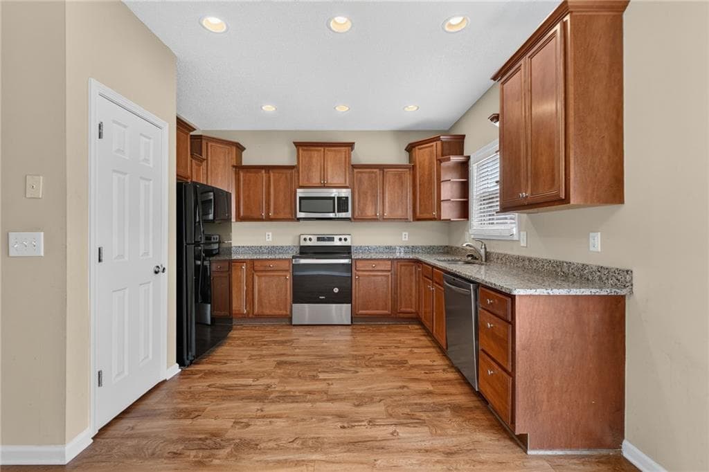4 bedroom, 4 bathroom townhouse for sale at 6345 Olmadison Place, Atlanta, GA 30349 — photo 9