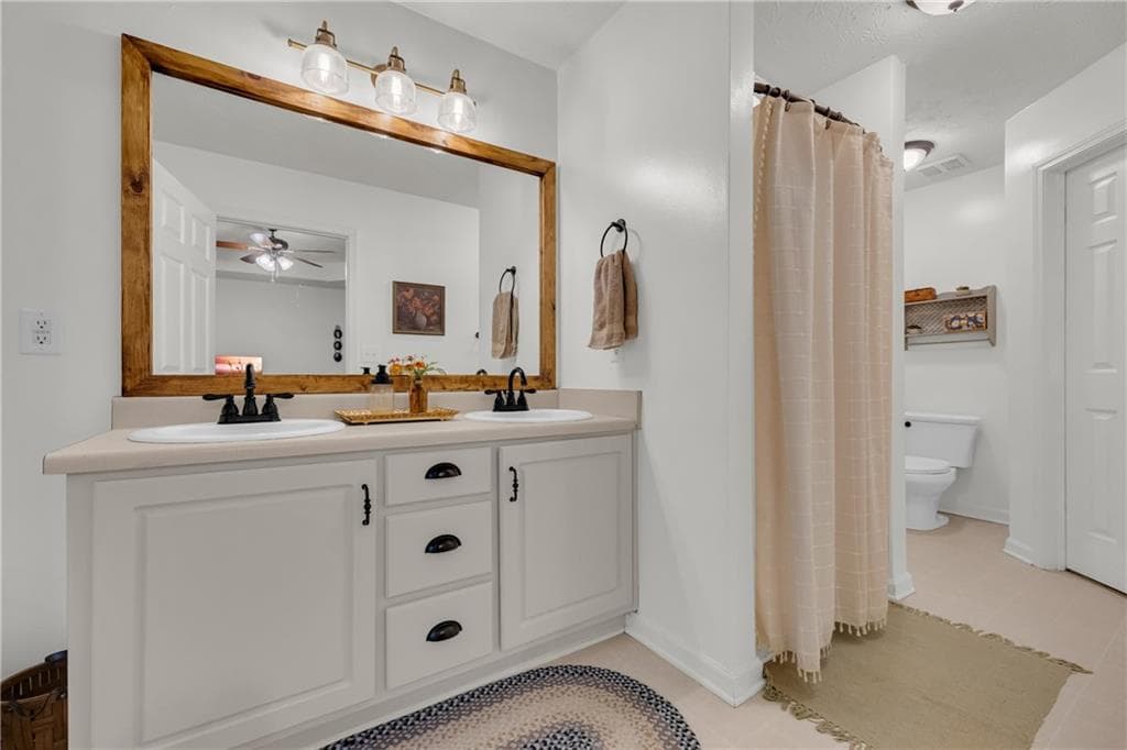 5 bedroom, 3 bathroom, 2,599 sq ft single family residence for sale at 1728 Riveredge Walk, Loganville, GA 30052 — photo 8