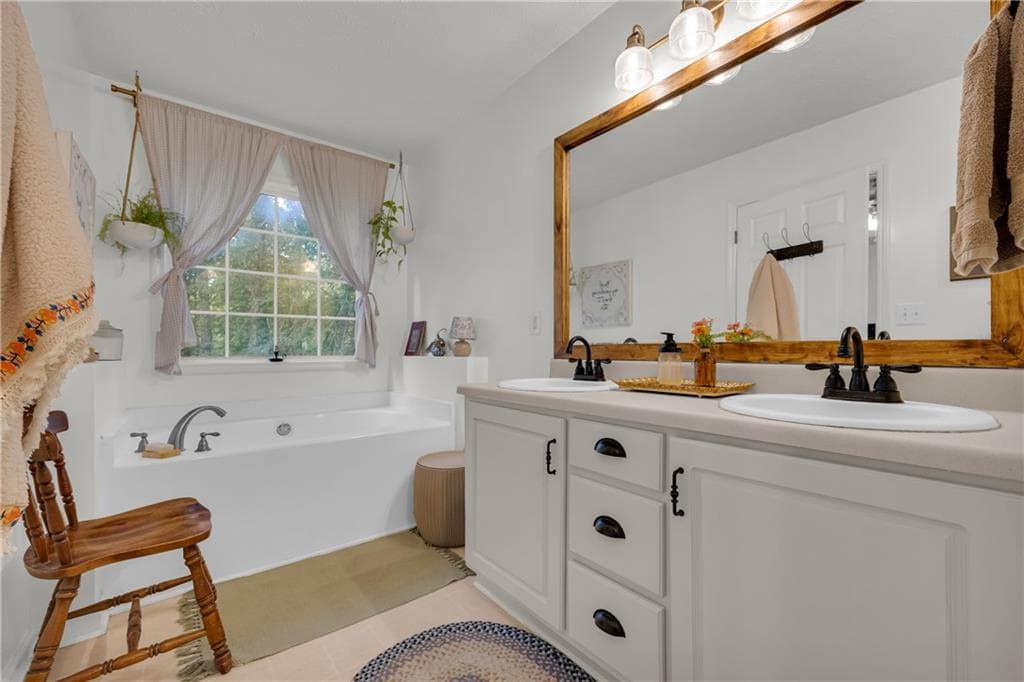 5 bedroom, 3 bathroom, 2,599 sq ft single family residence for sale at 1728 Riveredge Walk, Loganville, GA 30052 — photo 9