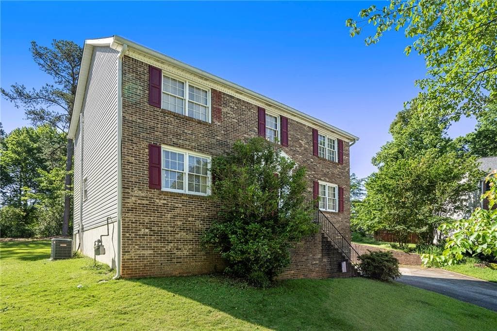 4 bedroom, 3 bathroom, 2,130 sq ft single family residence for sale at 2260 Deer Oaks Trail, Lawrenceville, GA 30044
