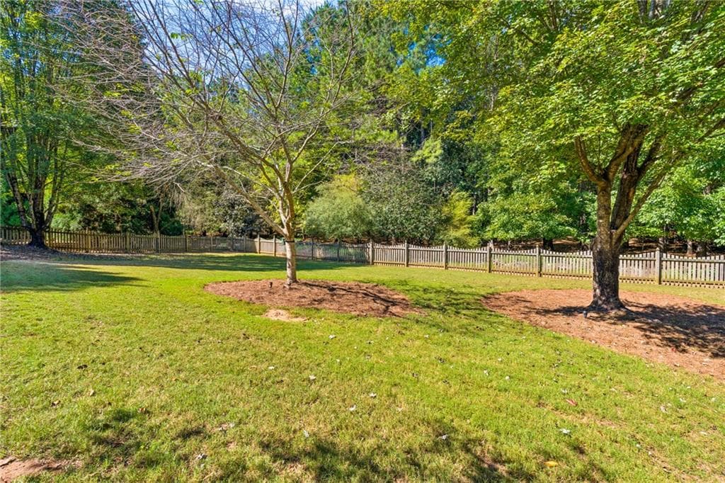 5 bedroom, 4 bathroom, 4,120 sq ft single family residence for sale at 230 Rivergate Drive, Suwanee, GA 30024 — photo 4
