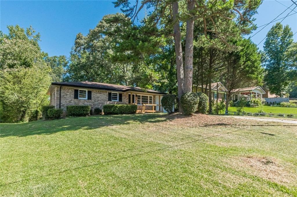 4 bedroom, 2 bathroom, 1,352 sq ft single family residence for sale at 6405 Kensington Court, Austell, GA 30106 — photo 4