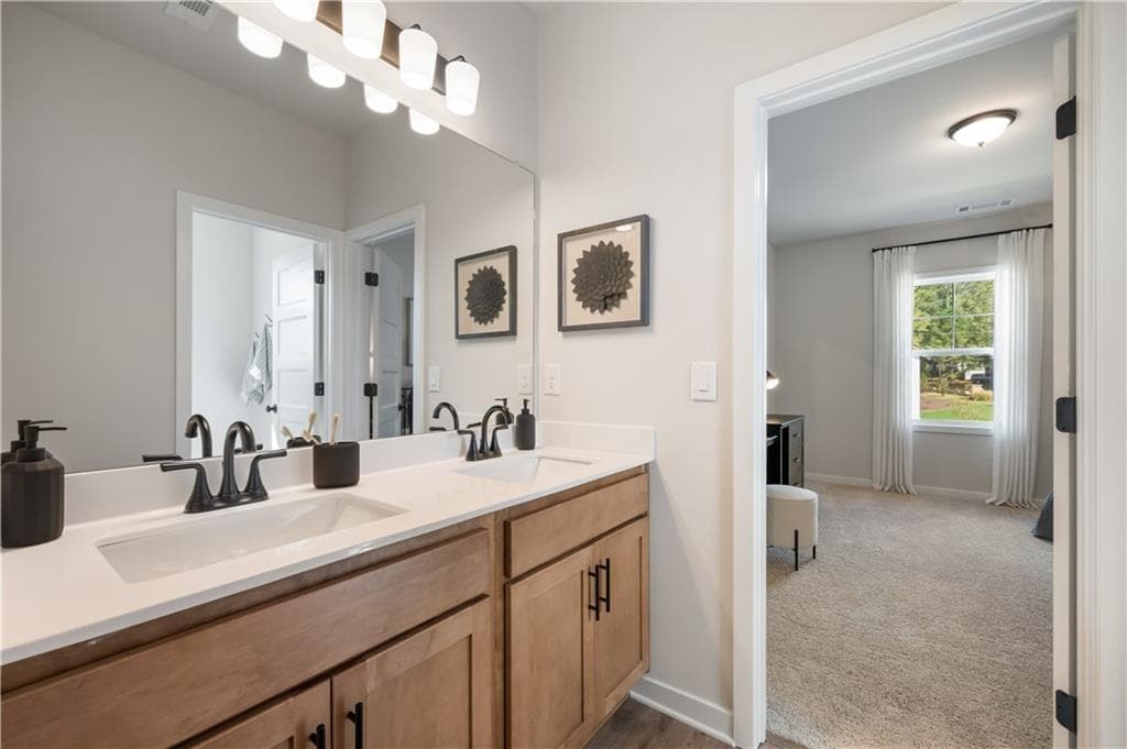 5 bedroom, 4 bathroom, 3,530 sq ft single family residence for sale at 672 Winding Rose Drive, Hoschton, GA 30548 — photo 4