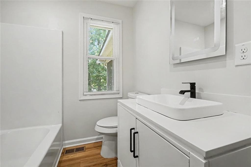 3 bedroom, 2 bathroom, 1,125 sq ft single family residence for sale at 2426 Woodland Drive, Kennesaw, GA 30152 — photo 9
