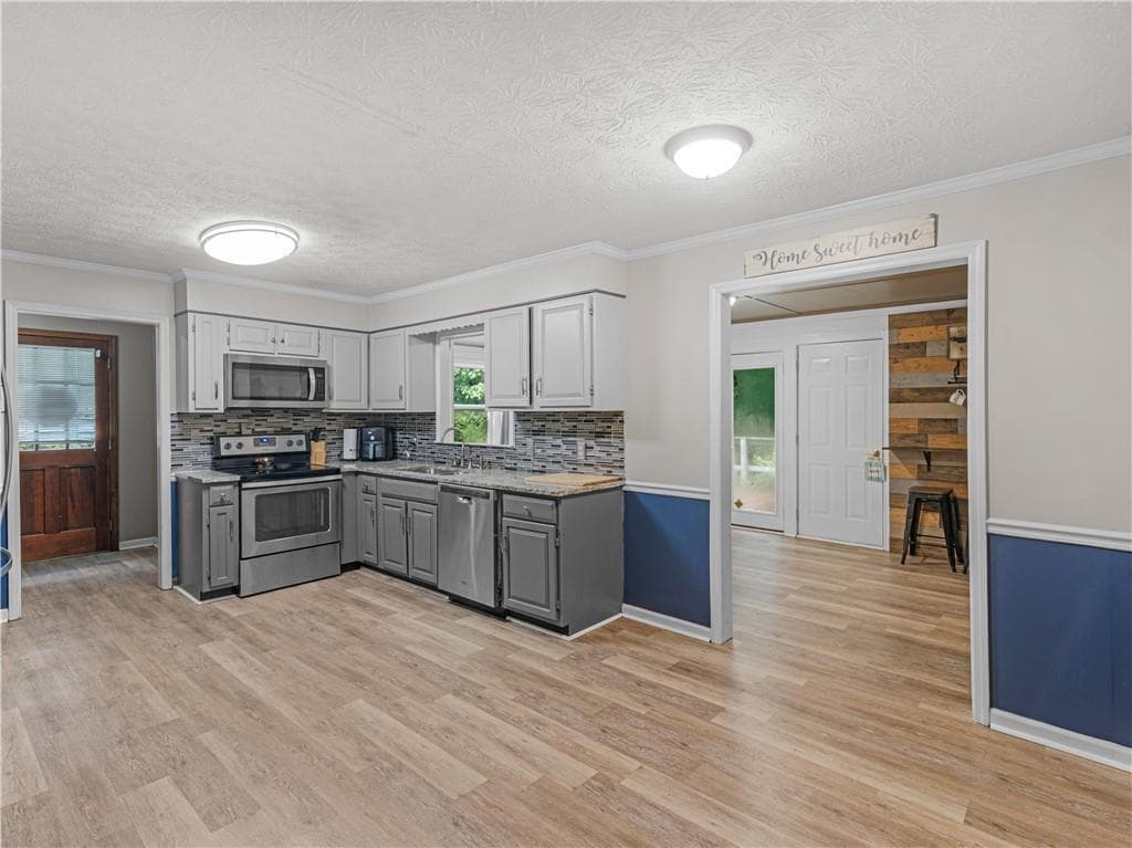 4 bedroom, 3 bathroom, 2,563 sq ft single family residence for sale at 185 Briar Patch Road, Covington, GA 30014 — photo 4