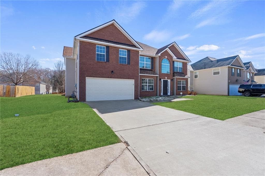 5 bedroom, 4 bathroom, 3,736 sq ft single family residence for sale at 541 Hamlet Drive, Hampton, GA 30228 — photo 2
