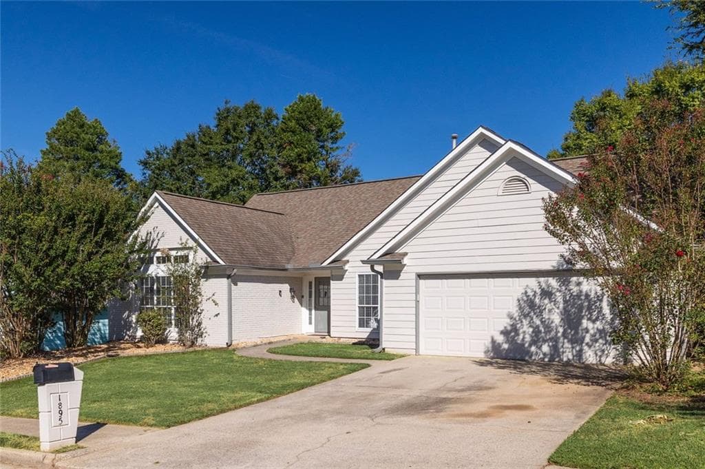 4 bedroom, 2 bathroom, 1,974 sq ft single family residence for sale at 1895 Conners Court, Lawrenceville, GA 30044 — photo 2