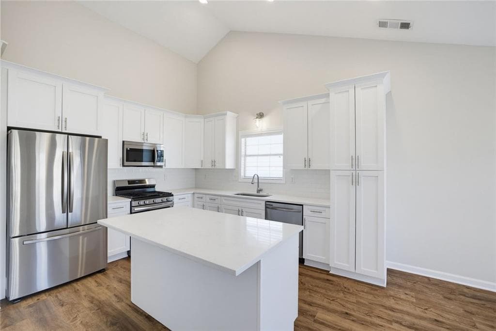 4 bedroom, 2 bathroom, 1,974 sq ft single family residence for sale at 1895 Conners Court, Lawrenceville, GA 30044 — photo 5