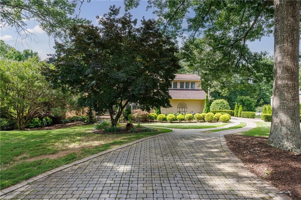 6 bedroom, 5 bathroom, 5,173 sq ft single family residence for sale at 4474 Cove Island Drive, Marietta, GA 30067 — photo 2