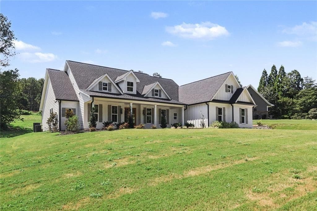 5 bedroom, 4 bathroom, 3,309 sq ft single family residence for sale at 105 W Lake Boulevard, Carrollton, GA 30116 — photo 2