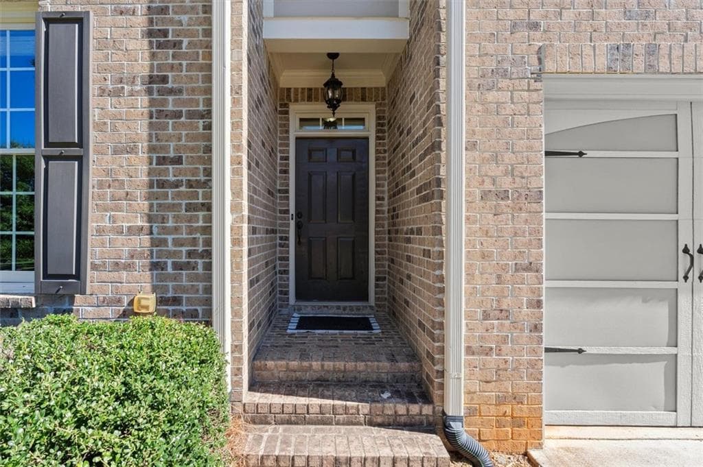 5 bedroom, 4 bathroom, 3,379 sq ft single family residence for sale at 310 Nichols Ridge Pointe, Suwanee, GA 30024 — photo 2