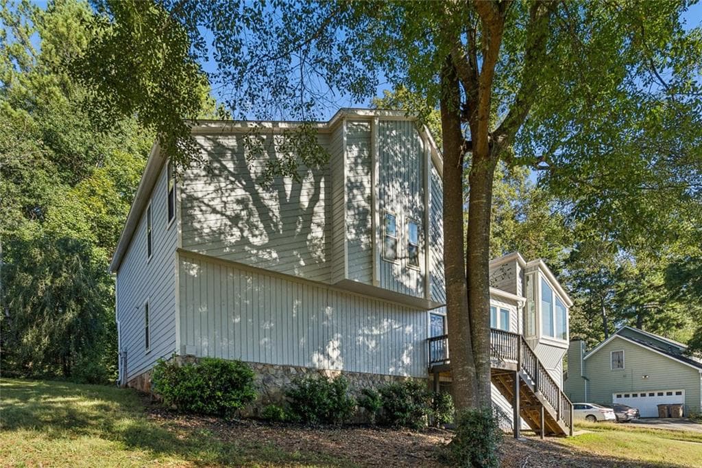 4 bedroom, 4 bathroom, 2,780 sq ft single family residence for sale at 587 Farmbrook Trail, Kennesaw, GA 30144 — photo 2
