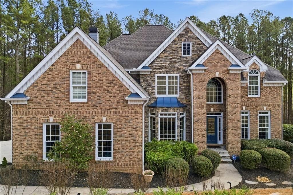 7 bedroom, 5 bathroom, 5,900 sq ft single family residence for sale at 613 Talmadge Lane, Canton, GA 30115 — photo 2