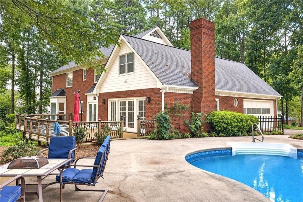 5 bedroom, 4 bathroom, 5,270 sq ft single family residence for sale at 1211 Bridgewater Walk, Snellville, GA 30078 — photo 2
