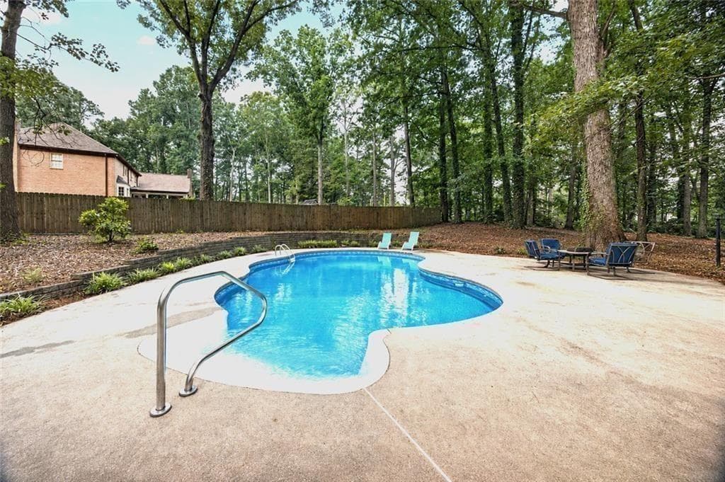 5 bedroom, 4 bathroom, 5,270 sq ft single family residence for sale at 1211 Bridgewater Walk, Snellville, GA 30078 — photo 3