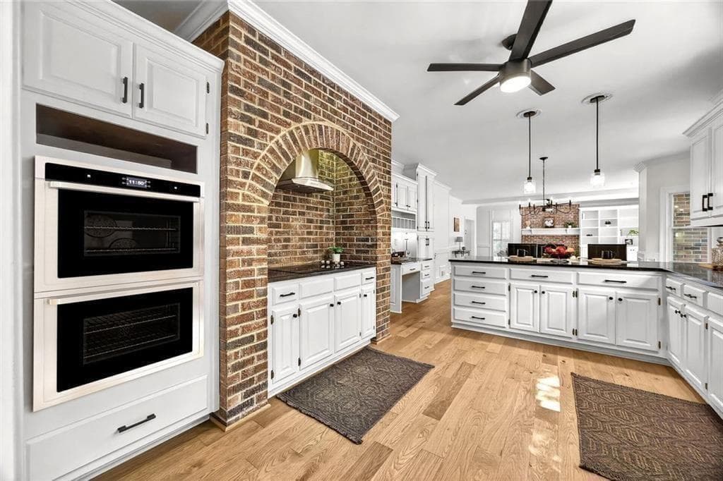 5 bedroom, 4 bathroom, 5,270 sq ft single family residence for sale at 1211 Bridgewater Walk, Snellville, GA 30078 — photo 5