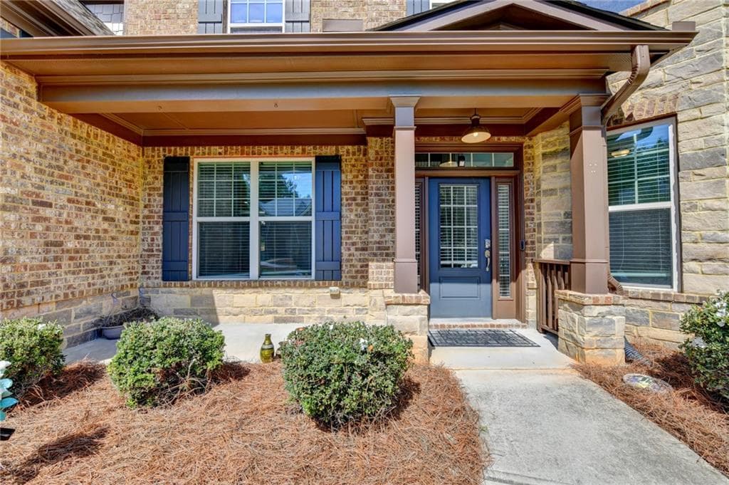 5 bedroom, 4 bathroom, 4,549 sq ft single family residence for sale at 4455 Barnsley Gardens Way, Cumming, GA 30040 — photo 2