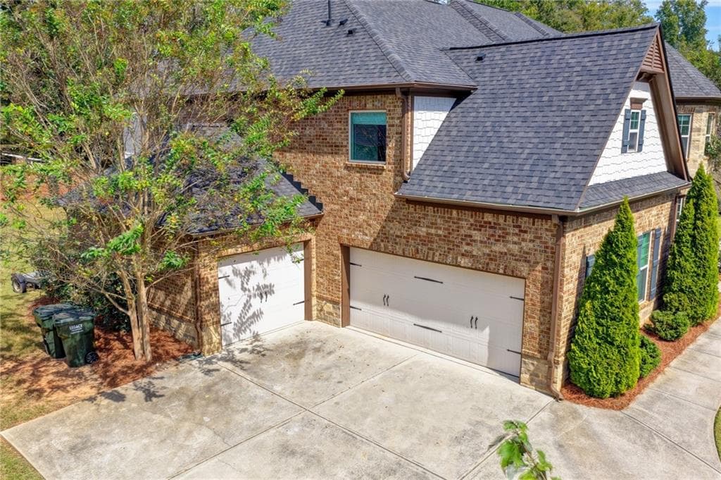 5 bedroom, 4 bathroom, 4,549 sq ft single family residence for sale at 4455 Barnsley Gardens Way, Cumming, GA 30040 — photo 3