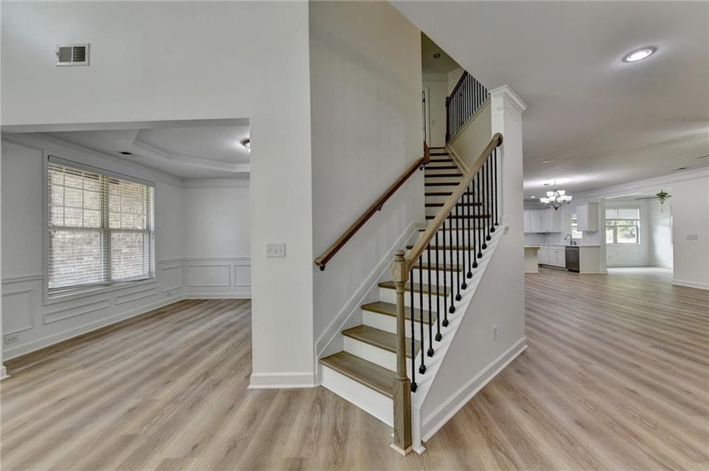 5 bedroom, 4 bathroom, 4,549 sq ft single family residence for sale at 4455 Barnsley Gardens Way, Cumming, GA 30040 — photo 4