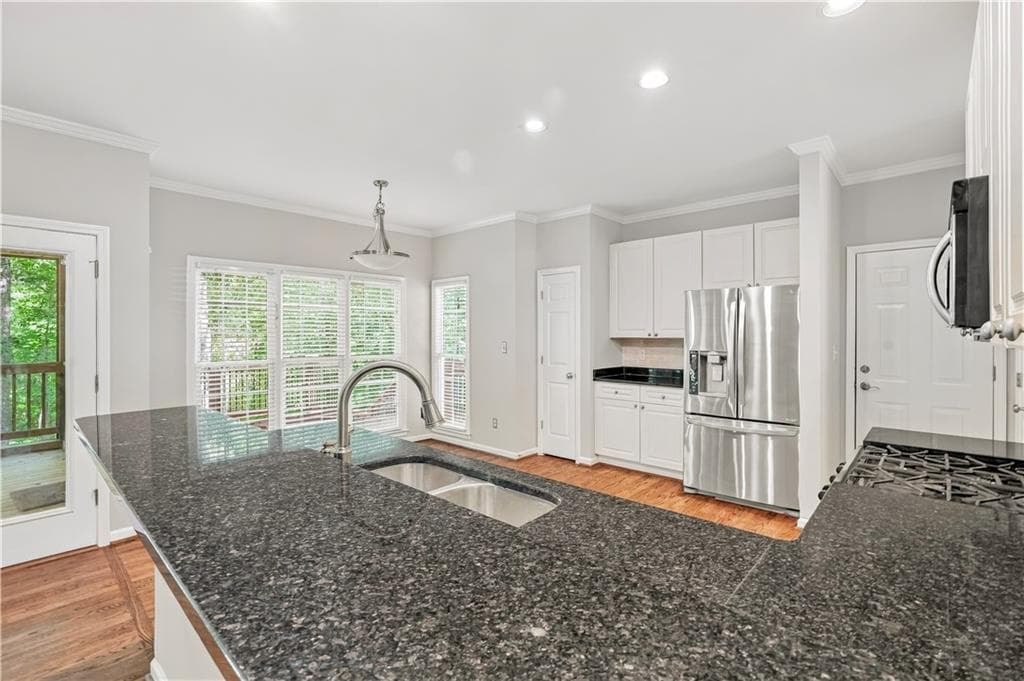 4 bedroom, 4 bathroom, 3,119 sq ft single family residence for sale at 4630 Ansley Lane, Cumming, GA 30040 — photo 9