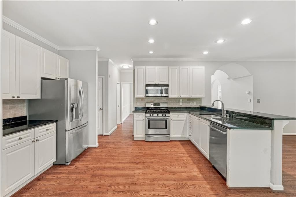4 bedroom, 4 bathroom, 3,119 sq ft single family residence for sale at 4630 Ansley Lane, Cumming, GA 30040 — photo 10