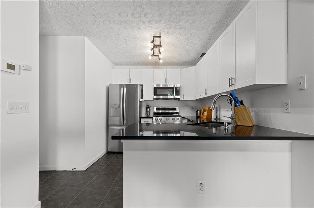 2 bedroom, 2 bathroom, 1,340 sq ft single family residence for sale at 3692 Avensong Village Circle, Milton, GA 30004 — photo 6