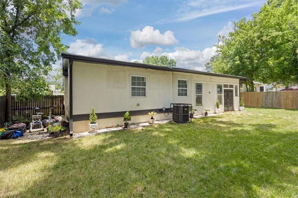 4 bedroom, 3 bathroom, 1,940 sq ft single family residence for sale at 255 Hummingbird Way, Riverdale, GA 30274 — photo 5