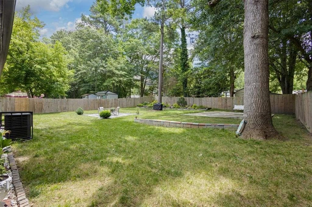 4 bedroom, 3 bathroom, 1,940 sq ft single family residence for sale at 255 Hummingbird Way, Riverdale, GA 30274 — photo 9