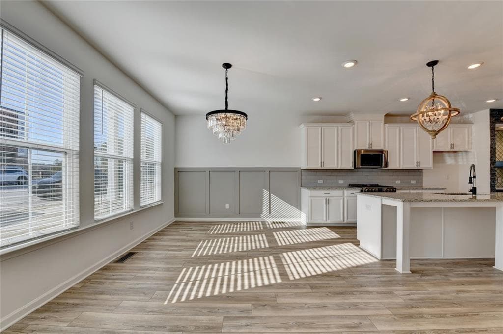 3 bedroom, 4 bathroom, 2,420 sq ft townhouse for sale at 2689 Richmond Row Drive, Suwanee, GA 30024 — photo 5