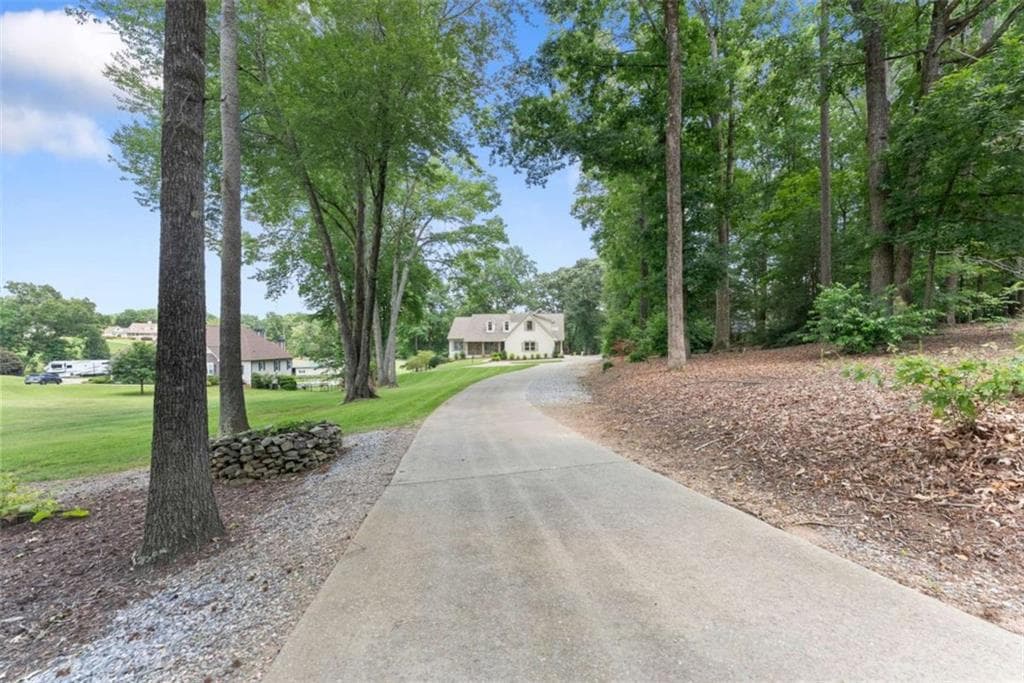 5 bedroom, 4 bathroom, 4,488 sq ft single family residence for sale at 5825 Sweetbottom Lane, Clermont, GA 30527 — photo 4