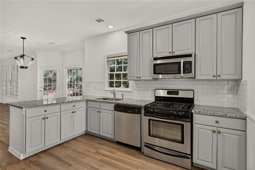4 bedroom, 4 bathroom, 3,068 sq ft single family residence for sale at 4935 Tidewater Way, Alpharetta, GA 30005 — photo 7