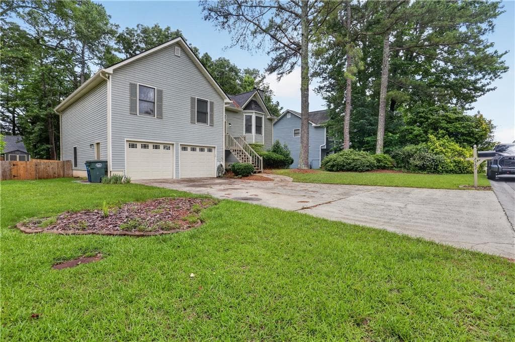 4 bedroom, 2 bathroom, 2,252 sq ft single family residence for sale at 2562 Kennesaw Springs Court, Kennesaw, GA 30144 — photo 3