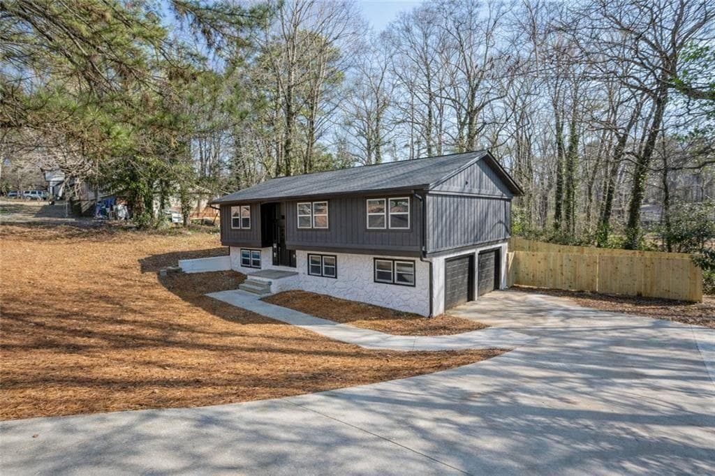 5 bedroom, 3 bathroom, 2,362 sq ft single family residence for sale at 2360 S Hairston Road, Decatur, GA 30035 — photo 2