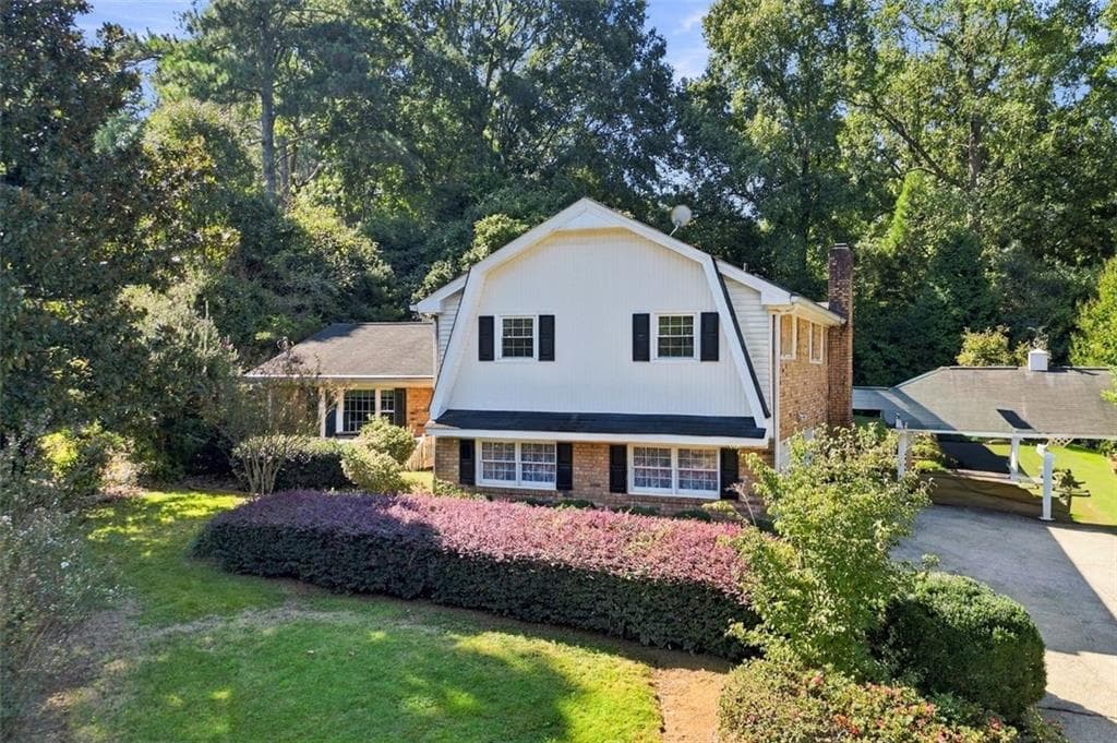 4 bedroom, 3 bathroom, 2,016 sq ft single family residence for sale at 2051 Hemlock Trail, Snellville, GA 30078 — photo 2