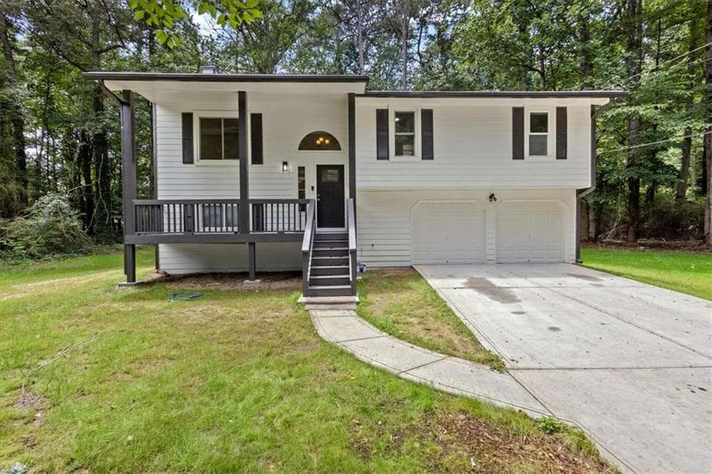 5 bedroom, 3 bathroom, 1,712 sq ft single family residence for sale at 2152 Cedar Creek Lane, Lithia Springs, GA 30122 — photo 2