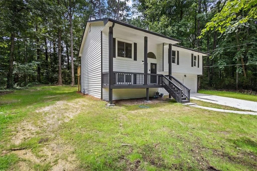 5 bedroom, 3 bathroom, 1,712 sq ft single family residence for sale at 2152 Cedar Creek Lane, Lithia Springs, GA 30122 — photo 3