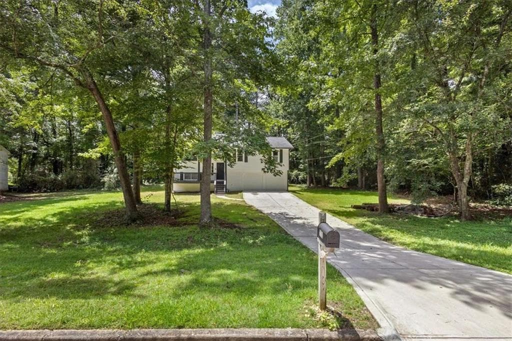 5 bedroom, 3 bathroom, 1,712 sq ft single family residence for sale at 2152 Cedar Creek Lane, Lithia Springs, GA 30122 — photo 4