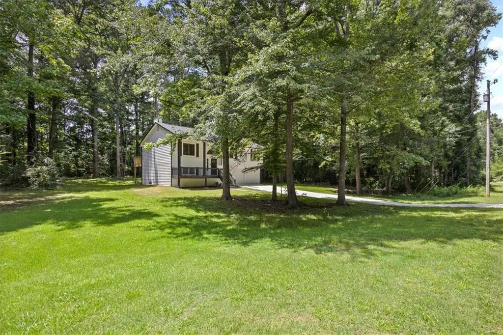 5 bedroom, 3 bathroom, 1,712 sq ft single family residence for sale at 2152 Cedar Creek Lane, Lithia Springs, GA 30122 — photo 5