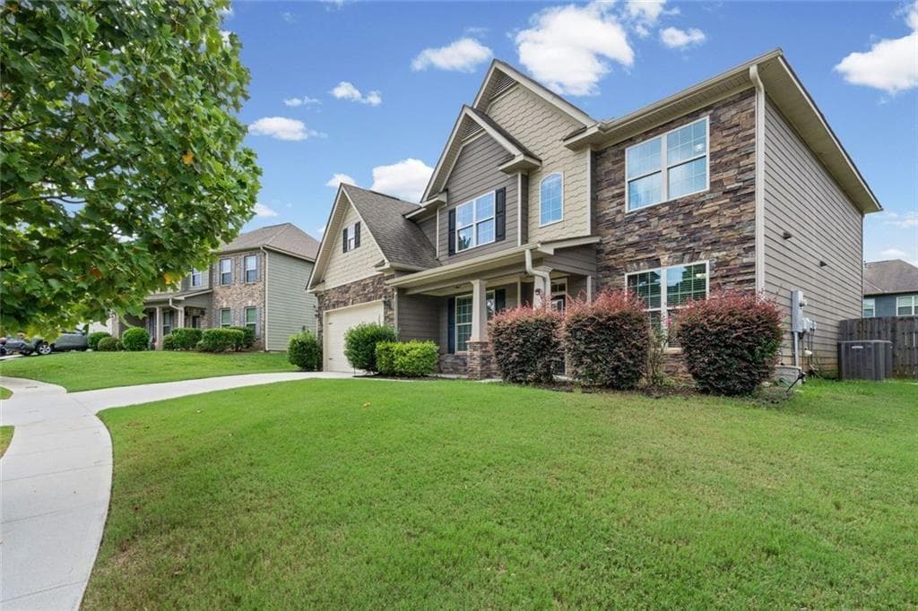 5 bedroom, 3 bathroom, 4,008 sq ft single family residence for sale at 1125 Acorn Oak Drive, Lawrenceville, GA 30045 — photo 2