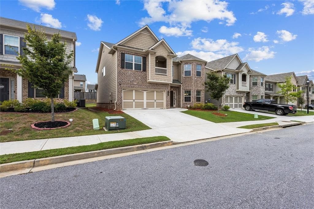 4 bedroom, 3 bathroom, 3,119 sq ft single family residence for sale at 1187 Kingston Hill Drive, Loganville, GA 30052 — photo 2