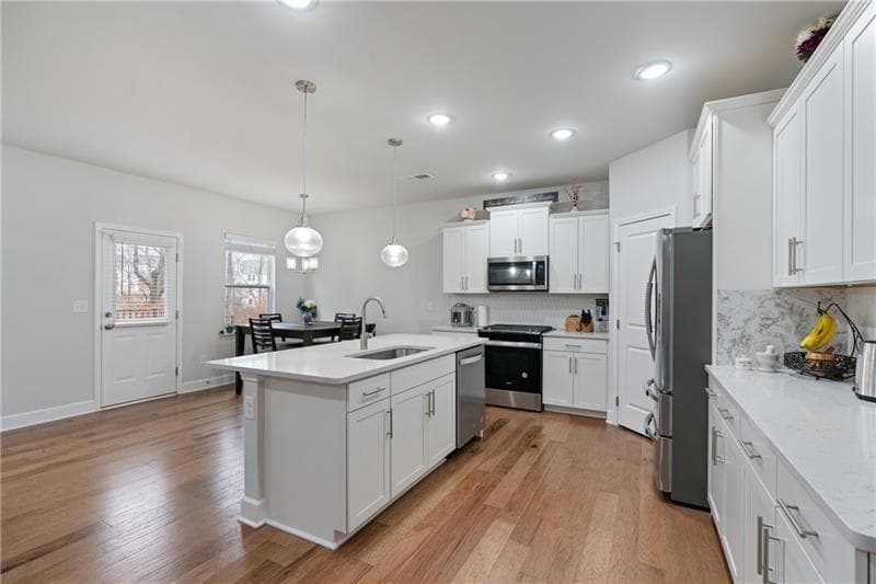 4 bedroom, 3 bathroom, 2,342 sq ft single family residence for sale at 5915 Pinnacle View Road, Cumming, GA 30040 — photo 3