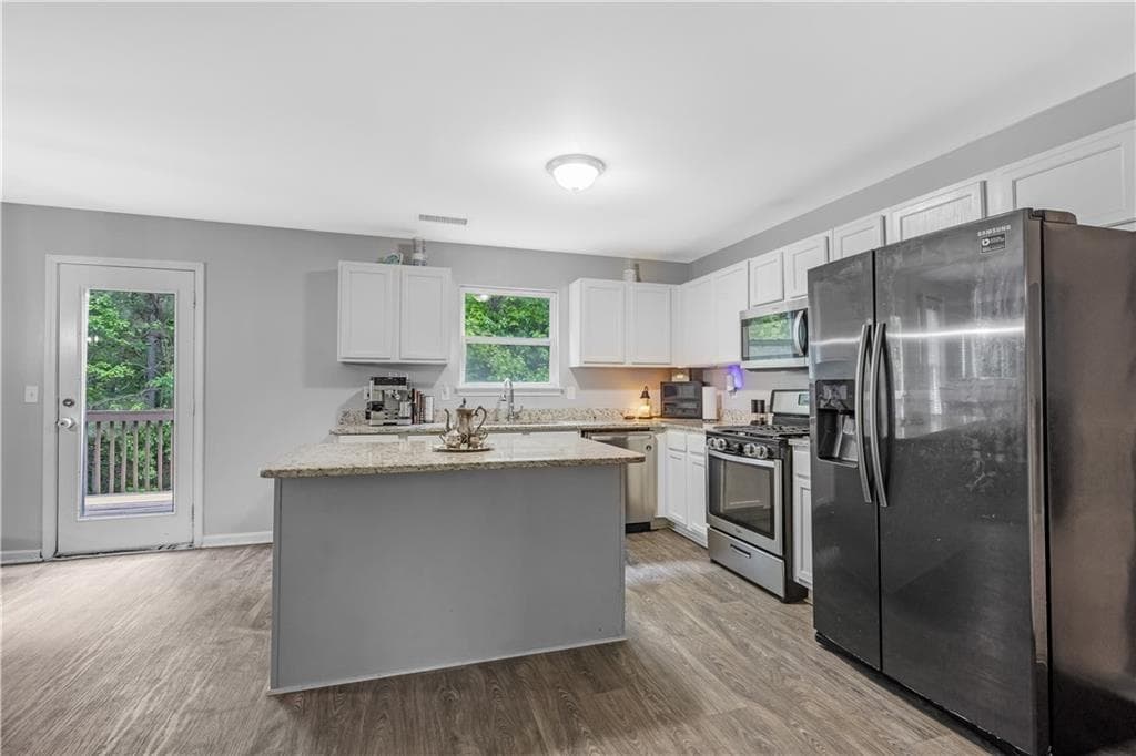 5 bedroom, 3 bathroom, 3,434 sq ft single family residence for sale at 3275 Hunting Creek Pass, Douglasville, GA 30135 — photo 7