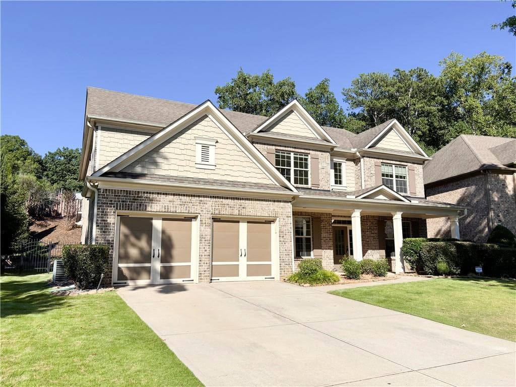 5 bedroom, 4 bathroom, 3,564 sq ft single family residence for sale at 3231 Lake Mcginnis Drive, Suwanee, GA 30024 — photo 2