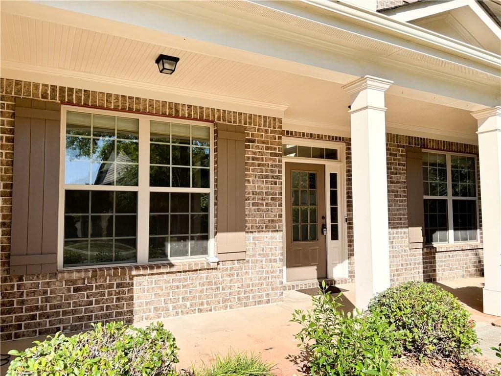 5 bedroom, 4 bathroom, 3,564 sq ft single family residence for sale at 3231 Lake Mcginnis Drive, Suwanee, GA 30024 — photo 3