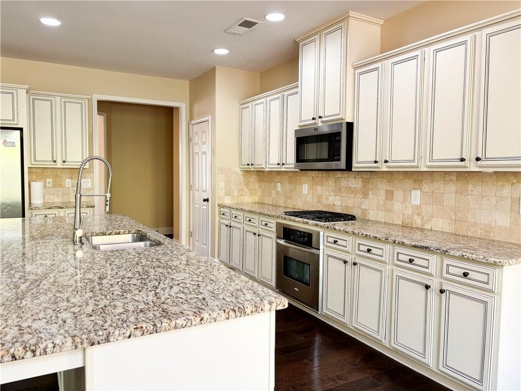 5 bedroom, 4 bathroom, 3,564 sq ft single family residence for sale at 3231 Lake Mcginnis Drive, Suwanee, GA 30024 — photo 10