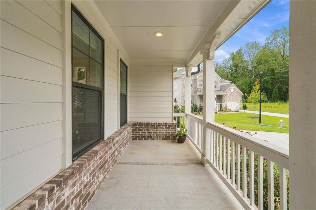 5 bedroom, 4 bathroom, 3,628 sq ft single family residence for sale at 8965 Tanner Crescent, Ball Ground, GA 30107 — photo 5