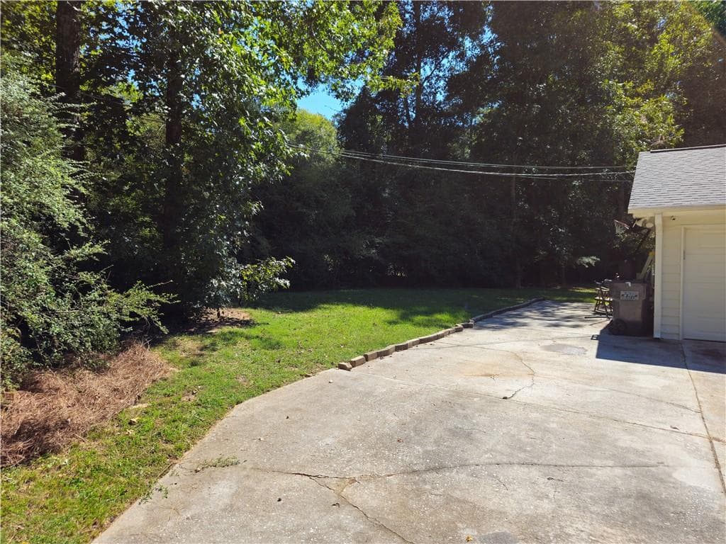 3 bedroom, 2 bathroom, 1,662 sq ft single family residence for sale at 690 Kirkus Drive, Conyers, GA 30094 — photo 5