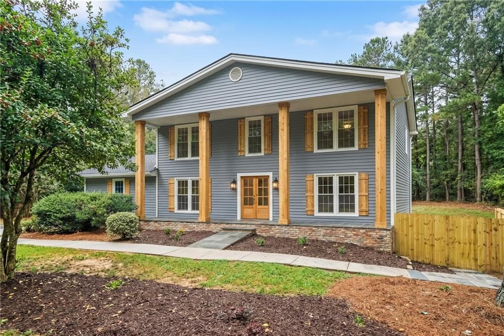 5 bedroom, 3 bathroom, 4,244 sq ft single family residence for sale at 1498 Meadowcreek Court, Atlanta, GA 30338